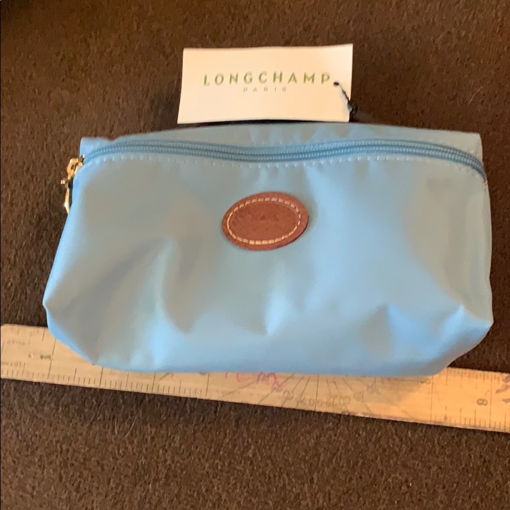 New. ExSm longchamp Paris purse!